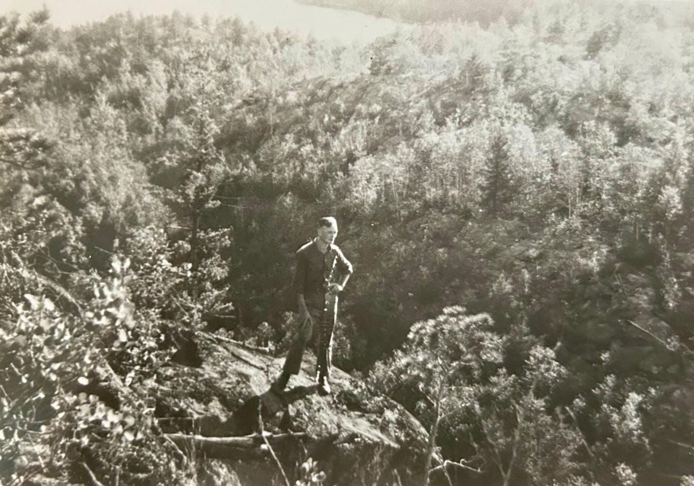 A person standing on a rock
Description automatically generated A person standing on a rock
Description automatically generated