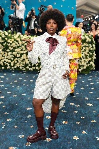 Image may contain Child Person Adult Clothing Footwear Shoe Accessories Jewelry Ring Wedding Face and Head