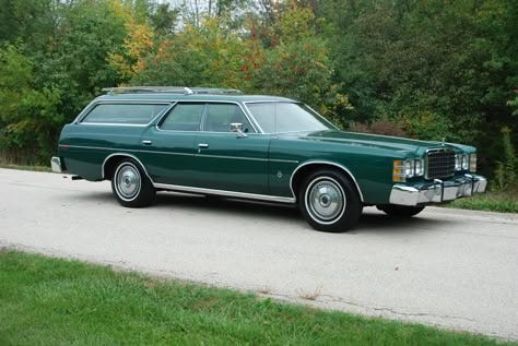Photo of a vintage green station wagon in green.