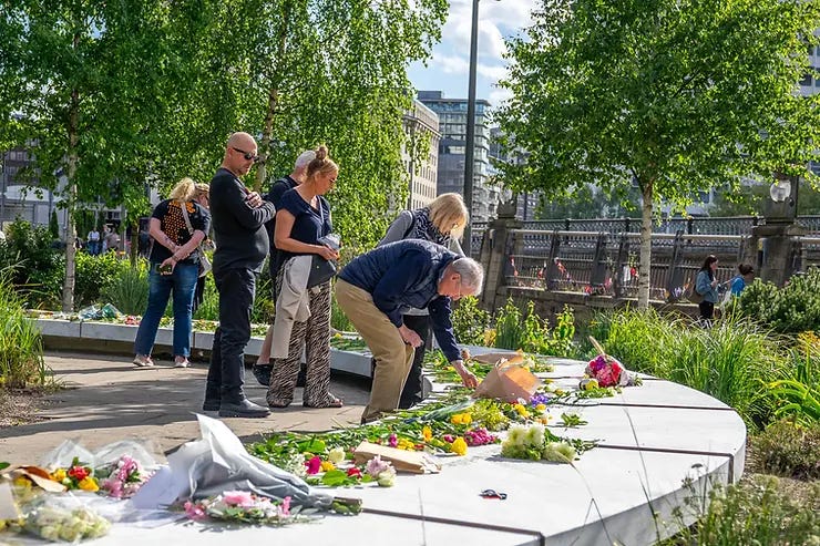 Floral tributes being laid at The Glade of Light on May 22nd. Floral tributes being laid at The Glade of Light on May 22nd.