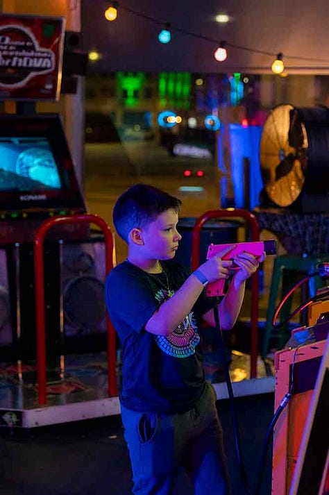 Gamers enjoying themselves at Maniac's Mansion