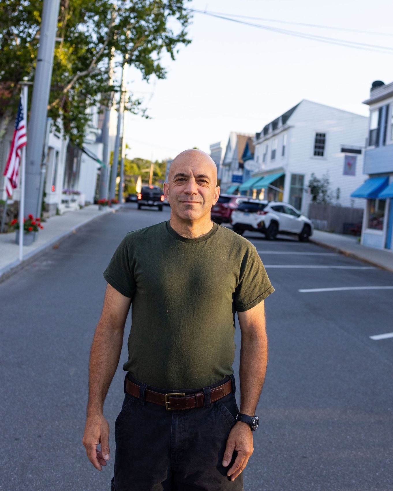 Steve Anastasia poses for a photo surrounded by businesses. Steve Anastasia poses for a photo surrounded by businesses.
