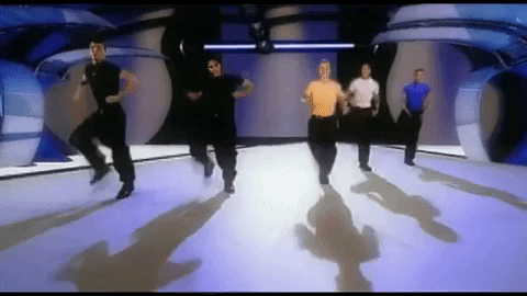 Lance is in the middle; the guys are back in the main space doing some weird arm roll thing and squatting.