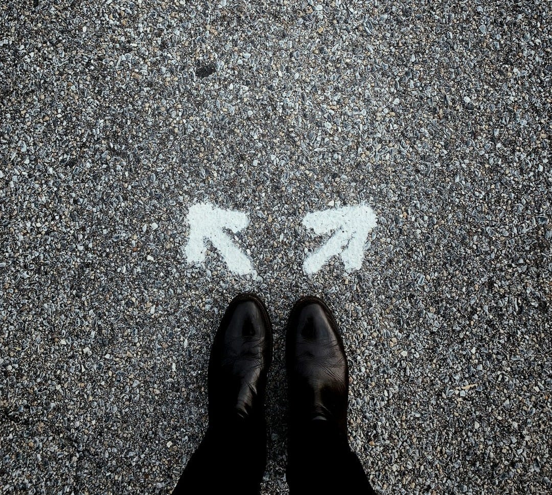 a person standing in the middle of a street