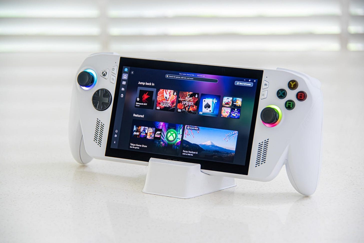 A white gaming device with a screen on it
AI-generated content may be incorrect. A white gaming device with a screen on it
AI-generated content may be incorrect.