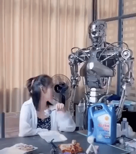 Oh awesome, a nice robot to help feed the kids. : r/gifs