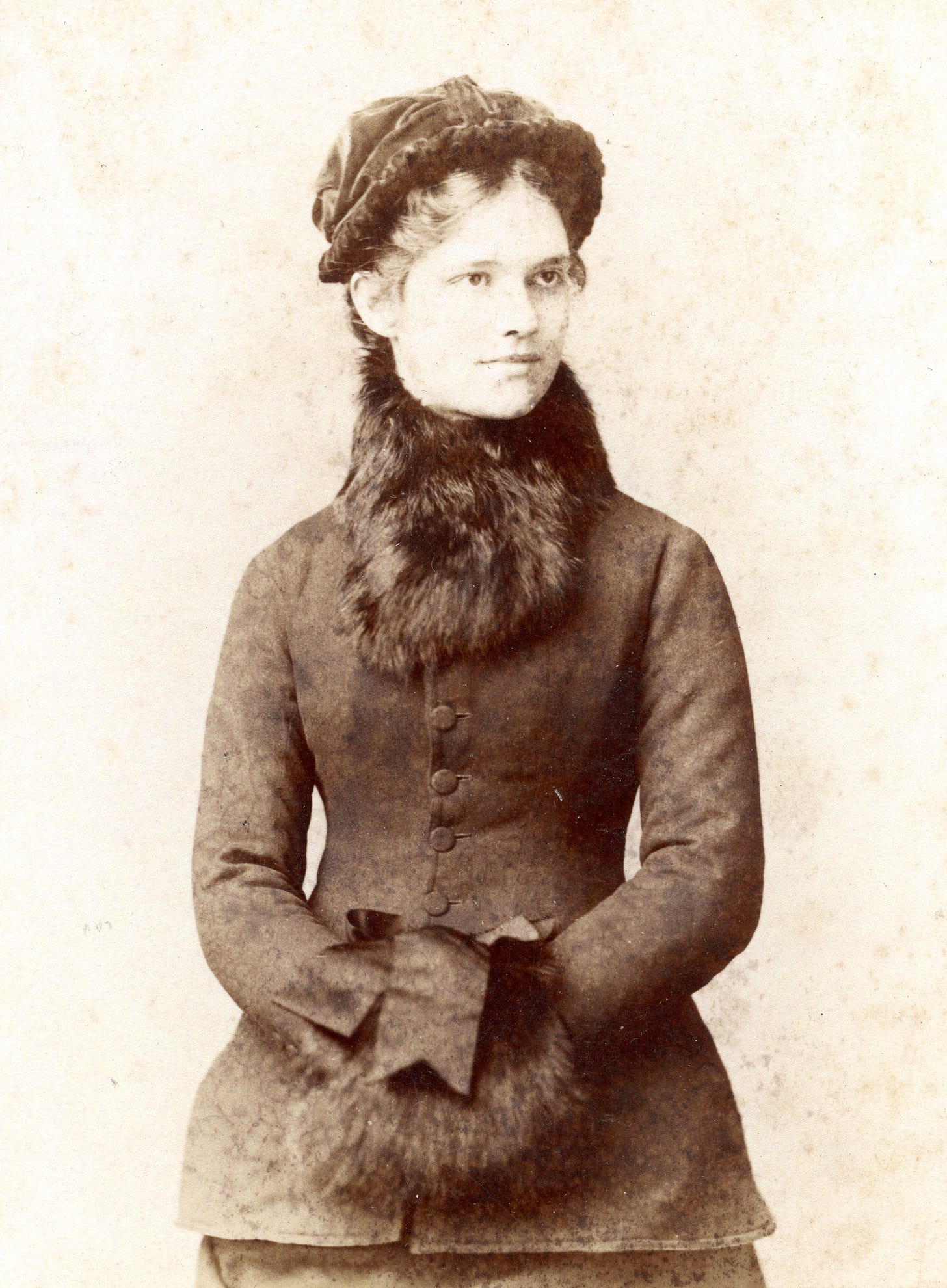 Woman with neck and hand warmers