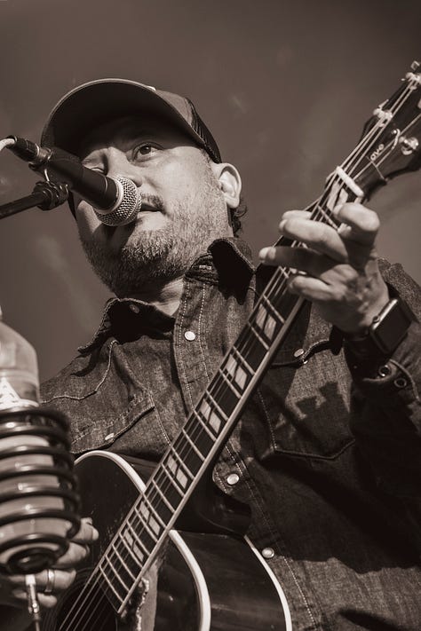 musicians onstage playing country music