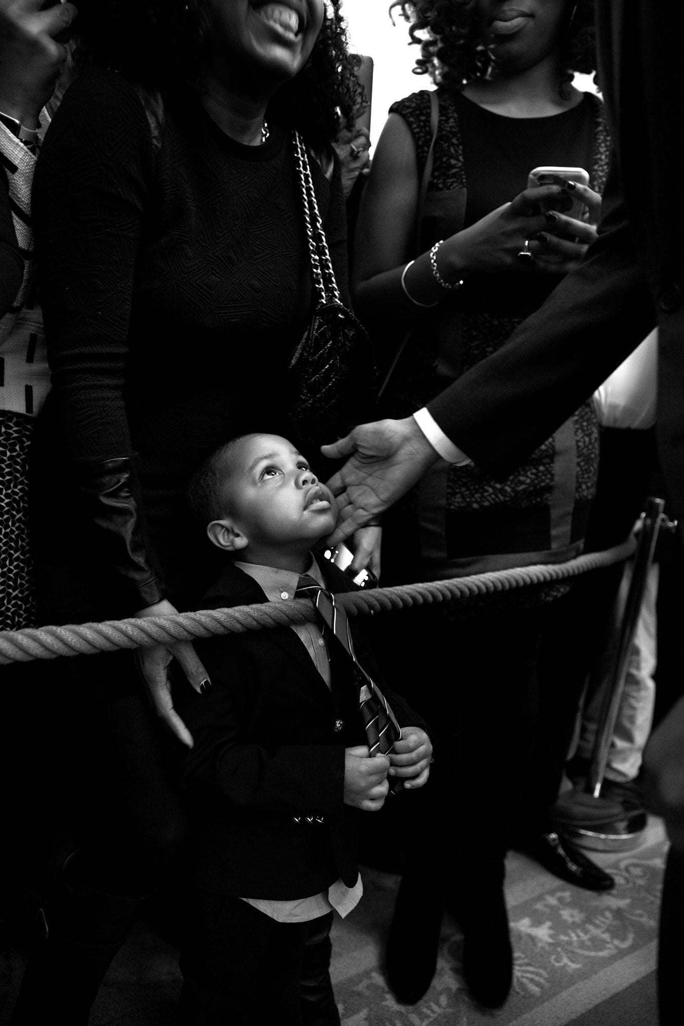 February 18, 2016: During an African American History Month reception, President Obama shares a tender moment with young Clark Reynolds, bending down to greet him along the rope line at the White House. February 18, 2016: During an African American History Month reception, President Obama shares a tender moment with young Clark Reynolds, bending down to greet him along the rope line at the White House.