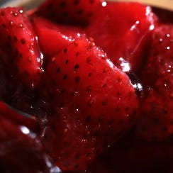 Photo shows chopped up strawberries, by Alexander Nedviga on Unsplash