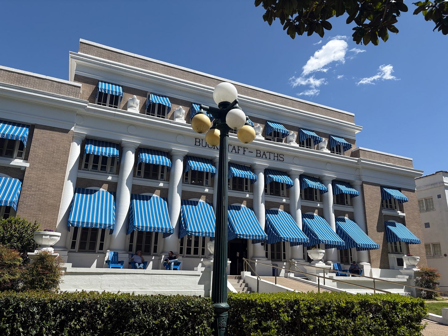 Buckstaff Baths building with its striped awnings and Doric columns