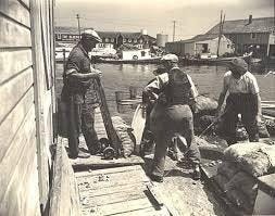 A group of men working on a dock
AI-generated content may be incorrect. A group of men working on a dock
AI-generated content may be incorrect.