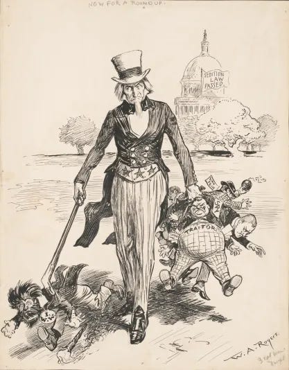 Drawing shows Uncle Sam rounding-up men labeled "Spy," "Traitor," "IWW," "Germ[an] money," and "Sinn Fein" with the United States Capitol in the background displaying a flag that states "Sedition law passed" referring to the Sedition Act of 1918.