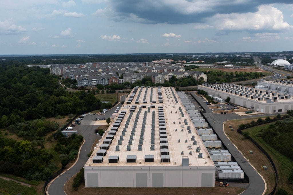 An aerial view shows an Amazon data center last year in Ashburn, Va. A new study found that most states offering subsidies for data centers do not disclose the recipients of those tax benefits. (Photo by Nathan Howard/Getty Images) An aerial view shows an Amazon data center last year in Ashburn, Va. A new study found that most states offering subsidies for data centers do not disclose the recipients of those tax benefits. (Photo by Nathan Howard/Getty Images)