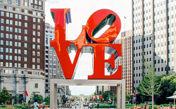 Robert Indiana's LOVE (1978), installed in Love Park, looking towards the Philadelphia Museum of Art Robert Indiana's LOVE (1978), installed in Love Park, looking towards the Philadelphia Museum of Art