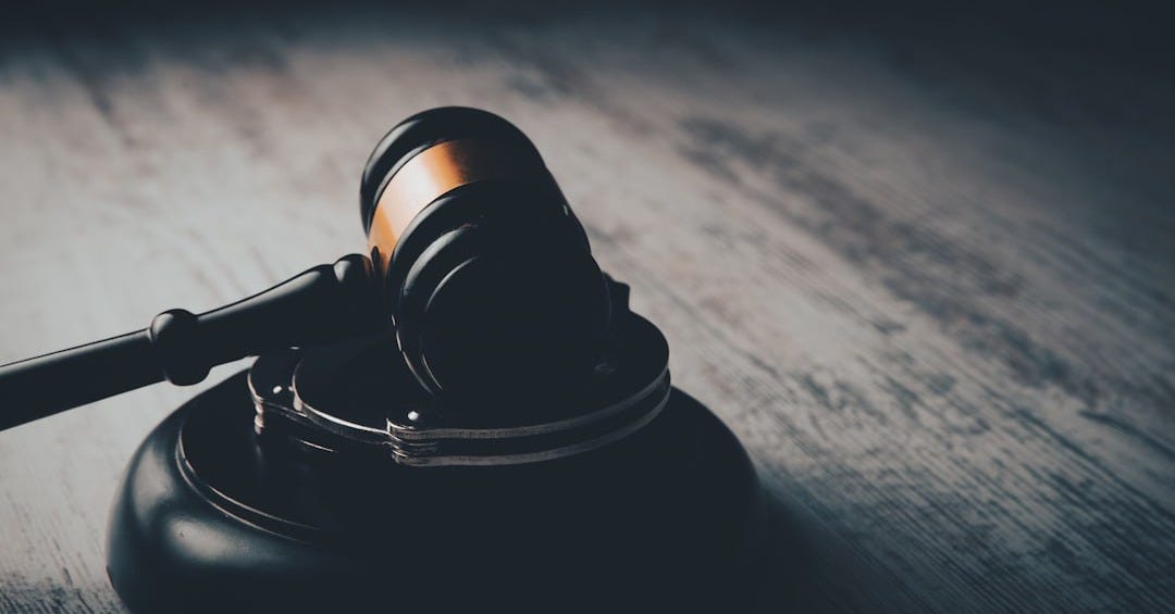 a judge's gaven on a wooden table