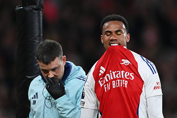 Gabriel of Arsenal looks dejected as he leaves the pitch after picking up an injury during the Premier League match between Arsenal FC and Fulham FC...