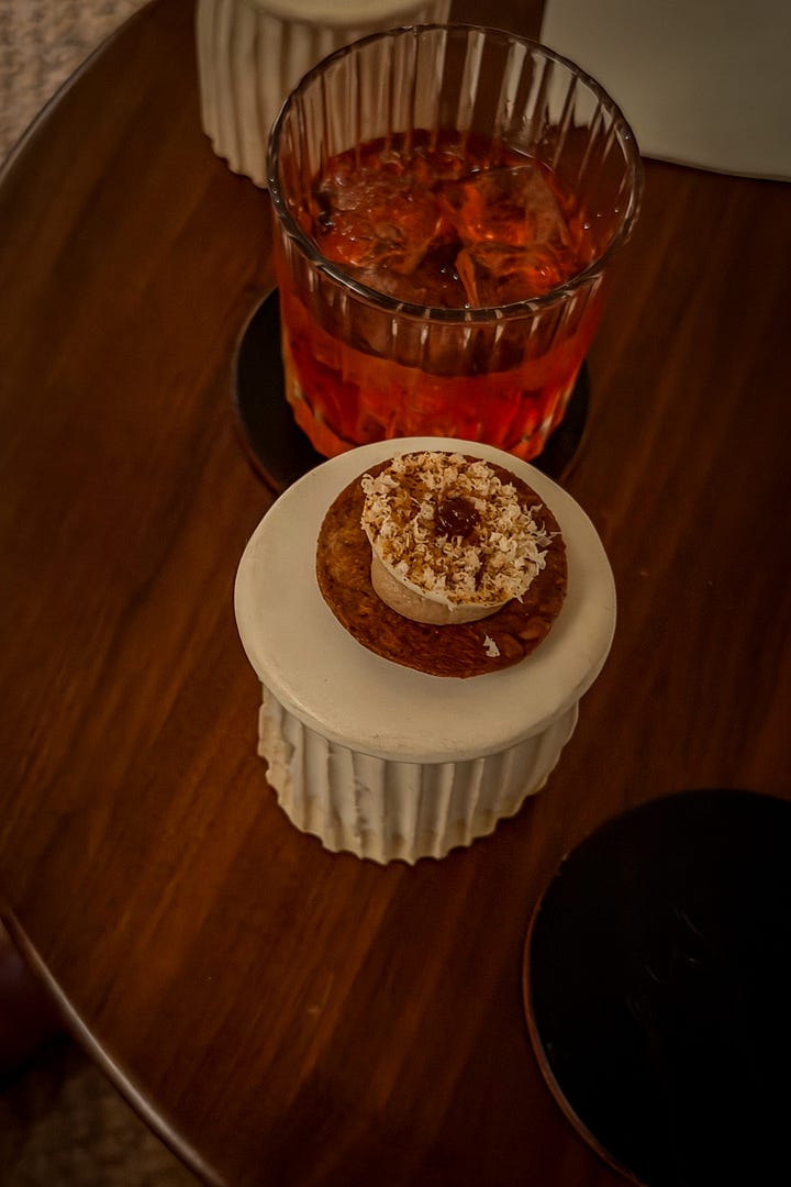 Mushroom tart and Granny Smith apple and trout snacks at Osip.