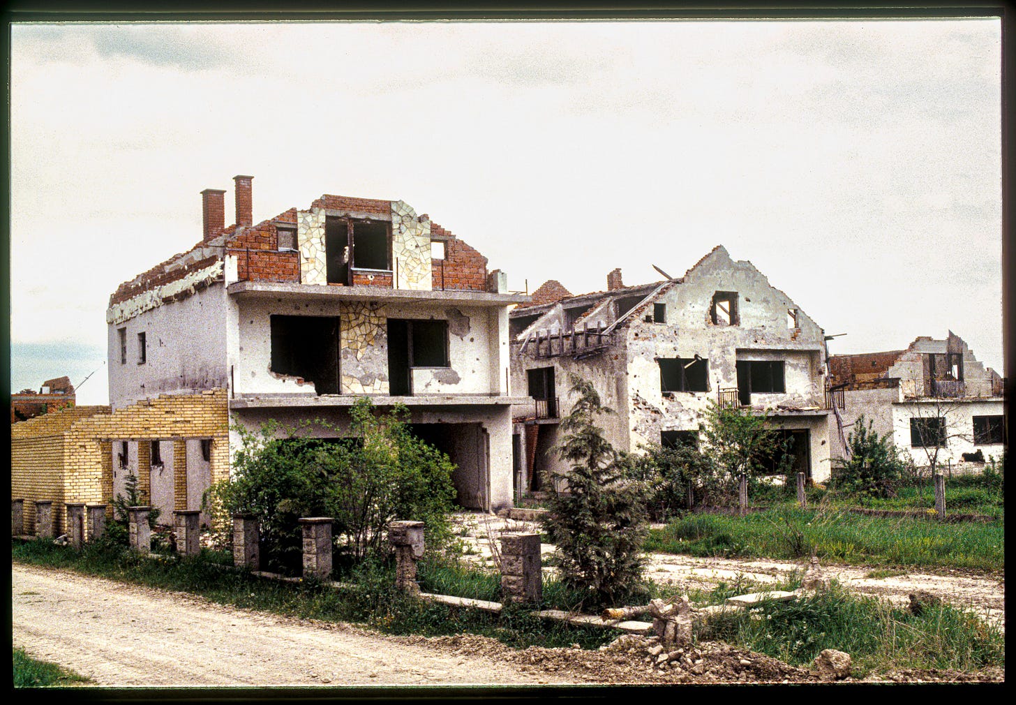 An eerie scene from an abandoned village in Bosnia, 1997.