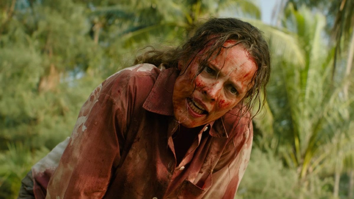 Rachel McAdams against jungle background, leaning forward, waist up, hair straggly, face covered with blood, looking earnest Rachel McAdams against jungle background, leaning forward, waist up, hair straggly, face covered with blood, looking earnest