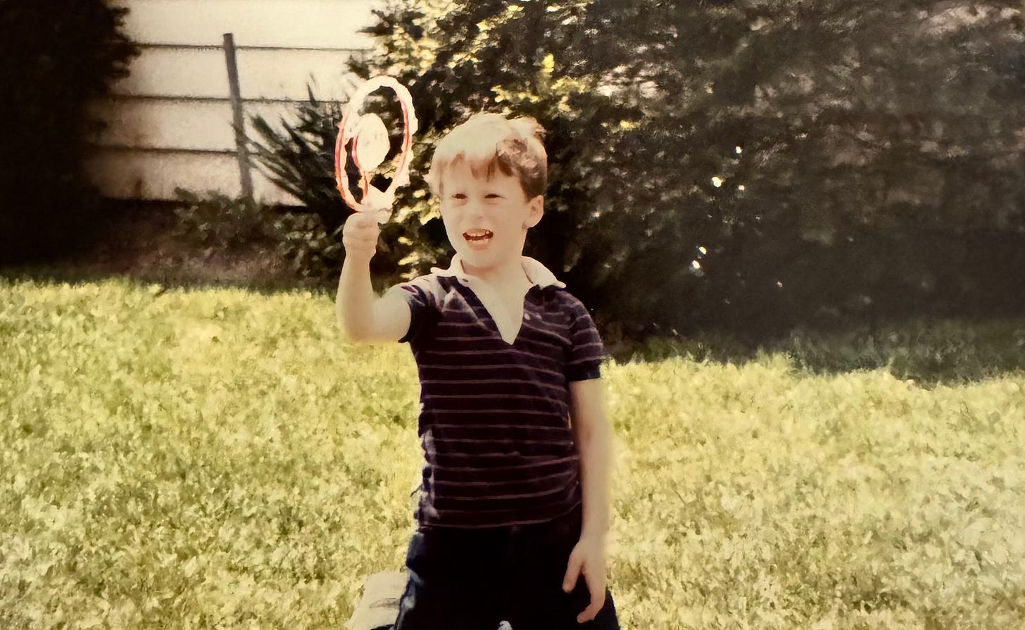 Photo of little Stephen Belenky blowing soap bubbles with intense concentration, framed to show the bubbles mid-air, matching the caption’s joke about taking the ending of friendships seriously