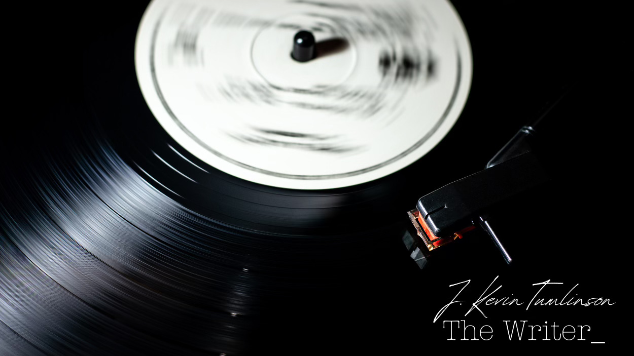 A vinyl record blurred by the motion of spinning.