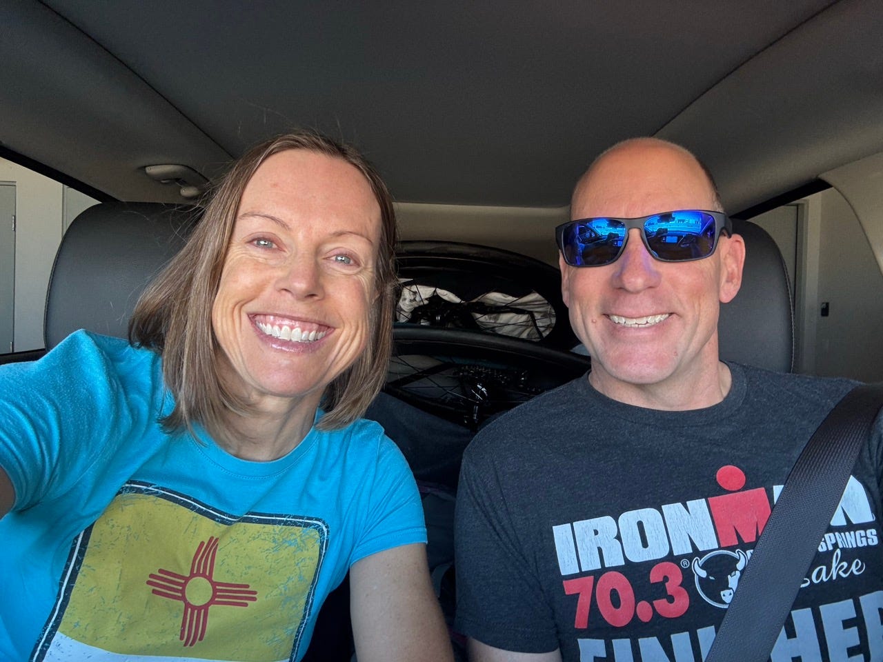 Jane and Todd Pilger in the car on the drive to Ruidoso 70.3 ironman triathlon