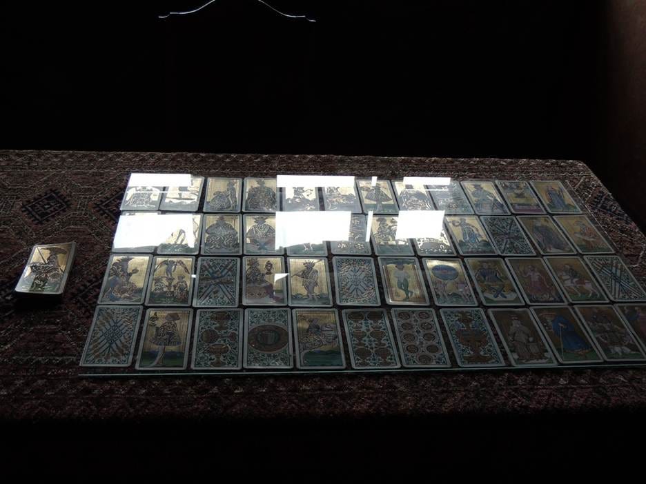 A group of cards on a table

AI-generated content may be incorrect.