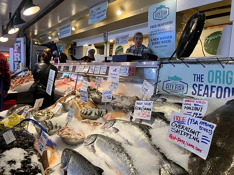 Pikes Market, fish, flowers, pig, and Puget Sound