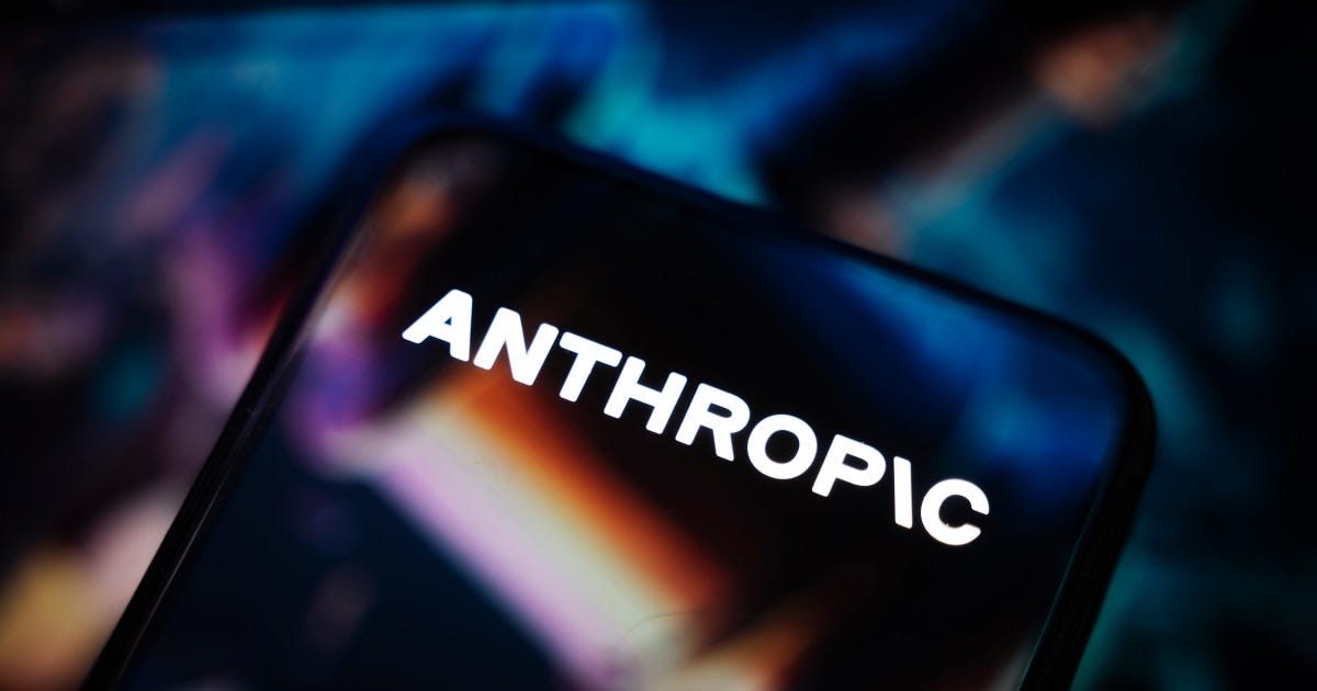 Anthropic logo on a smartphone screen against a blurred dark background, ahead of its Nasdaq IPO Anthropic logo on a smartphone screen against a blurred dark background, ahead of its Nasdaq IPO