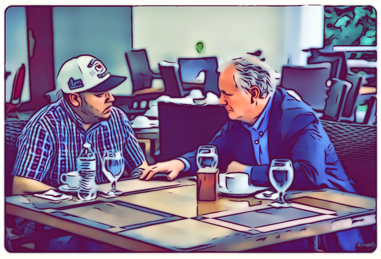 A couple of men sitting at a table

AI-generated content may be incorrect.