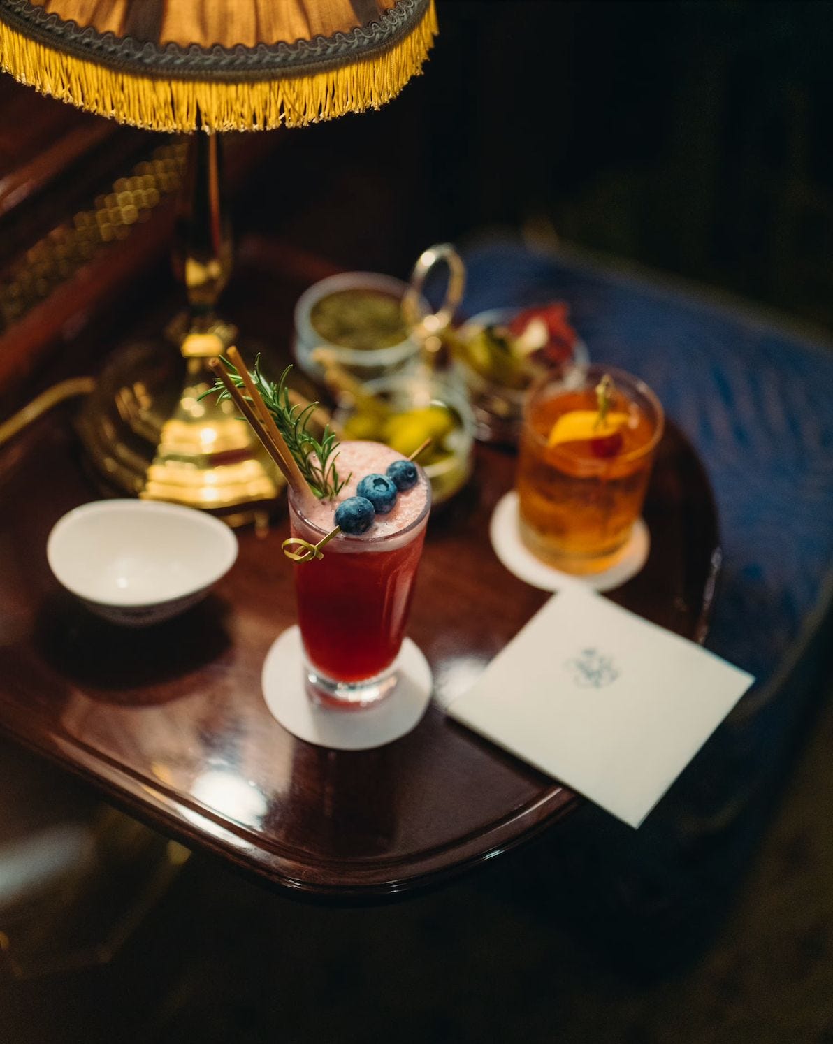 Cocktails and drinks served in the bar car of the Venice Simplon-Orient-Express. Cocktails and drinks served in the bar car of the Venice Simplon-Orient-Express.