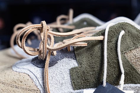 The hairy suede, baseball glove laces, and Vibram outsole on the Saint65 SV1 “Radici”