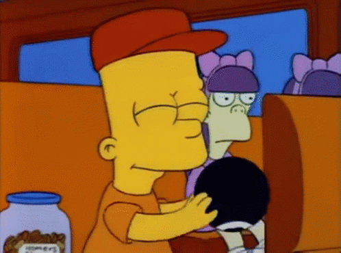 bart simpson from the simpsons is holding a black object in his hand bart simpson from the simpsons is holding a black object in his hand