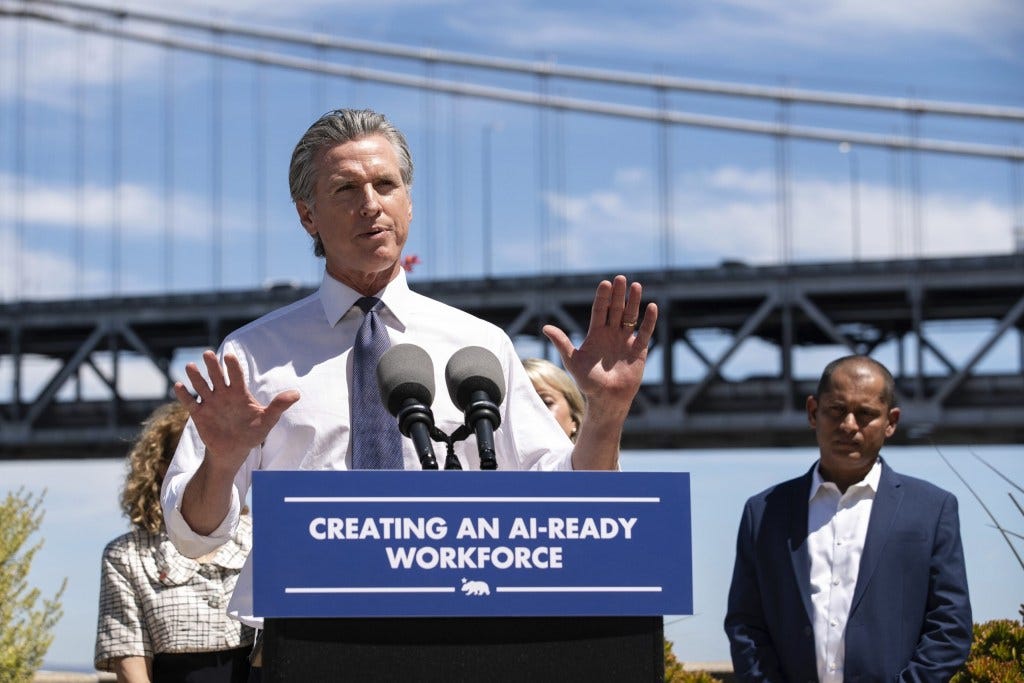 AI redefines expertise and could be a boon for workers. Here, Governor Gavin Newsom holds a press conference at the Google office in San Francisco on Thursday, Aug. 7, 2025, to announce new AI partnerships.