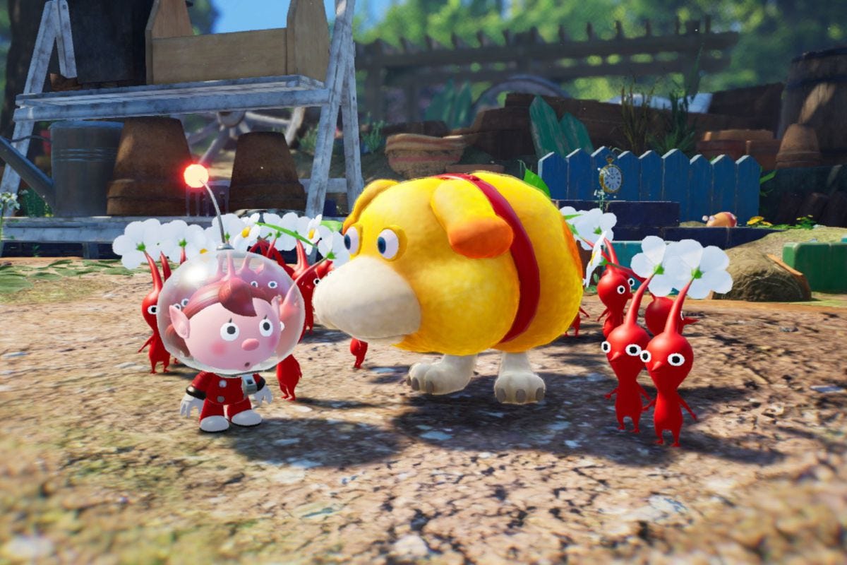 Pikmin 4’s spaceman stands next to Oatchi the dog and a group of red Pikmin