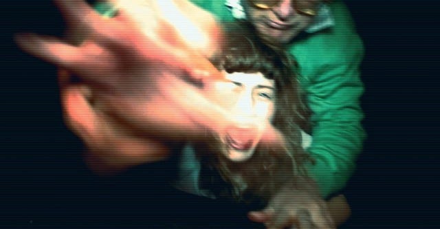 Blurry, dimly lit moment of Megan being violently abducted by a man — a disturbing scene that triggered the film’s viral notoriety.