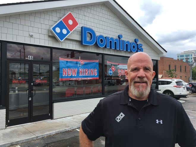 Domino's Pizza franchise owner John Eckburg, who started with the pizza chain as a delivery driver, will open his 11th Domino's Sunday at the corner of 13th and Reynolds streets. [DAMON CLINE/THE AUGUSTA CHRONICLE]