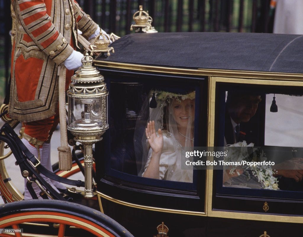British Royalty. London, England. July 1986. Wedding of Prince Andrew. Bride Sarah Ferguson waves from the carriage at it arrives at Westminster Abbey.