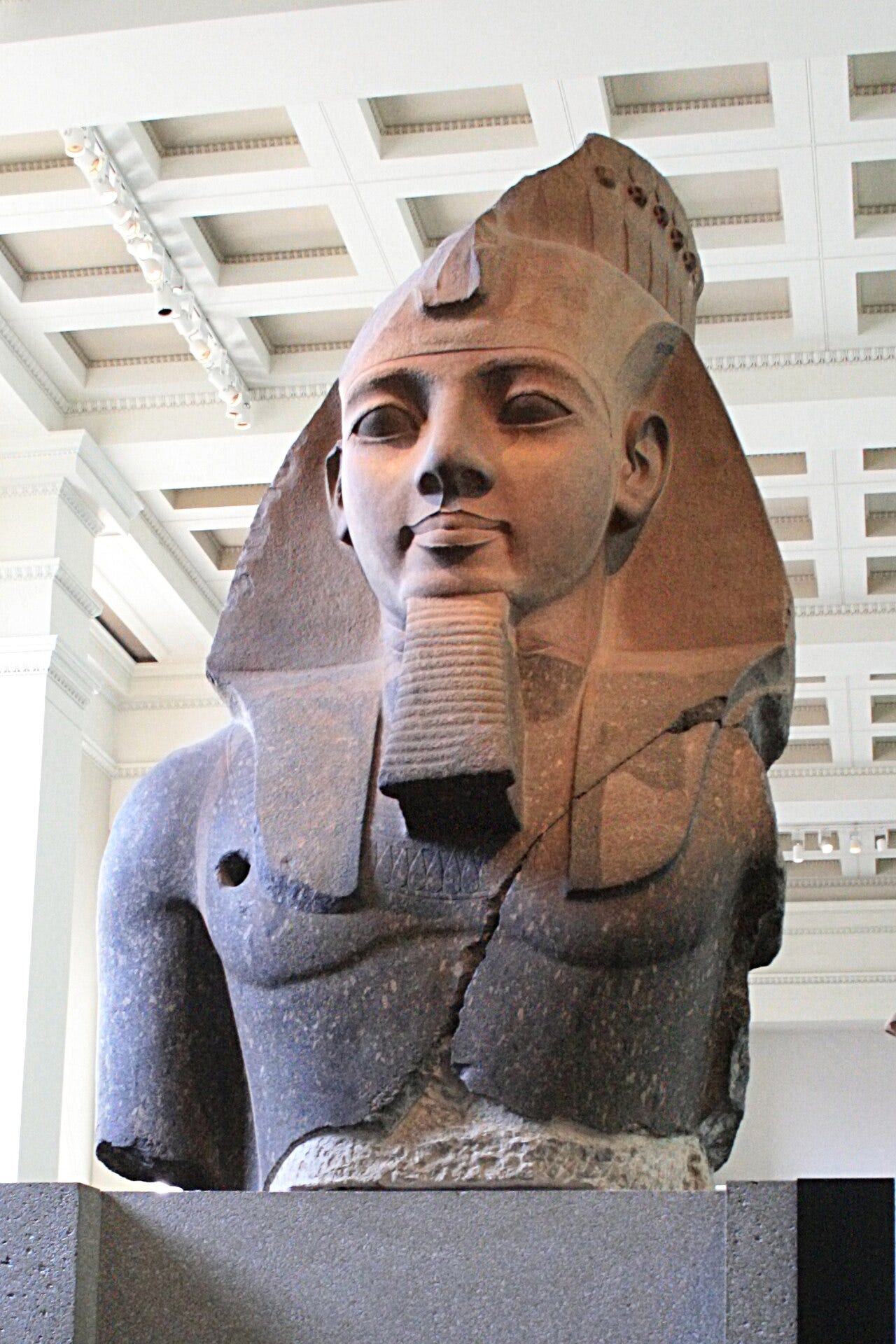 The Younger Memnon (c. 1250 BC), a statue depicting Ramesses II, from the Ramesseum in Luxor (Thebes). Currently on display at the British Museum in London.