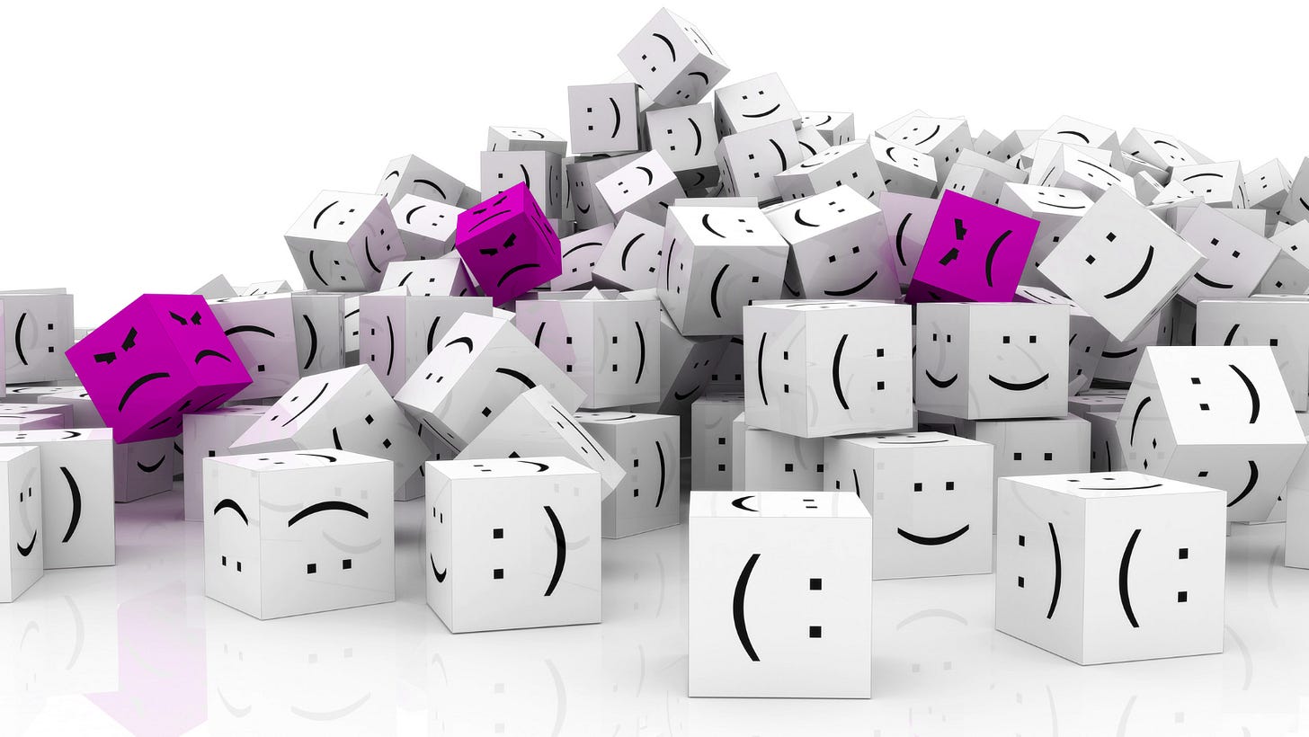 Multiple cubes with emoji smiley faces in all directions
