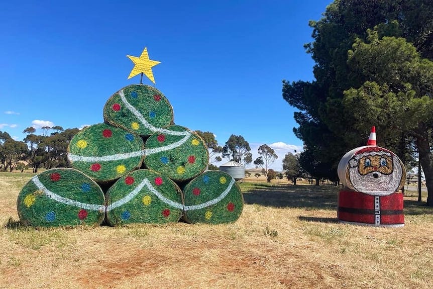 hay bales turned into a christmas tree and santa hay bales turned into a christmas tree and santa