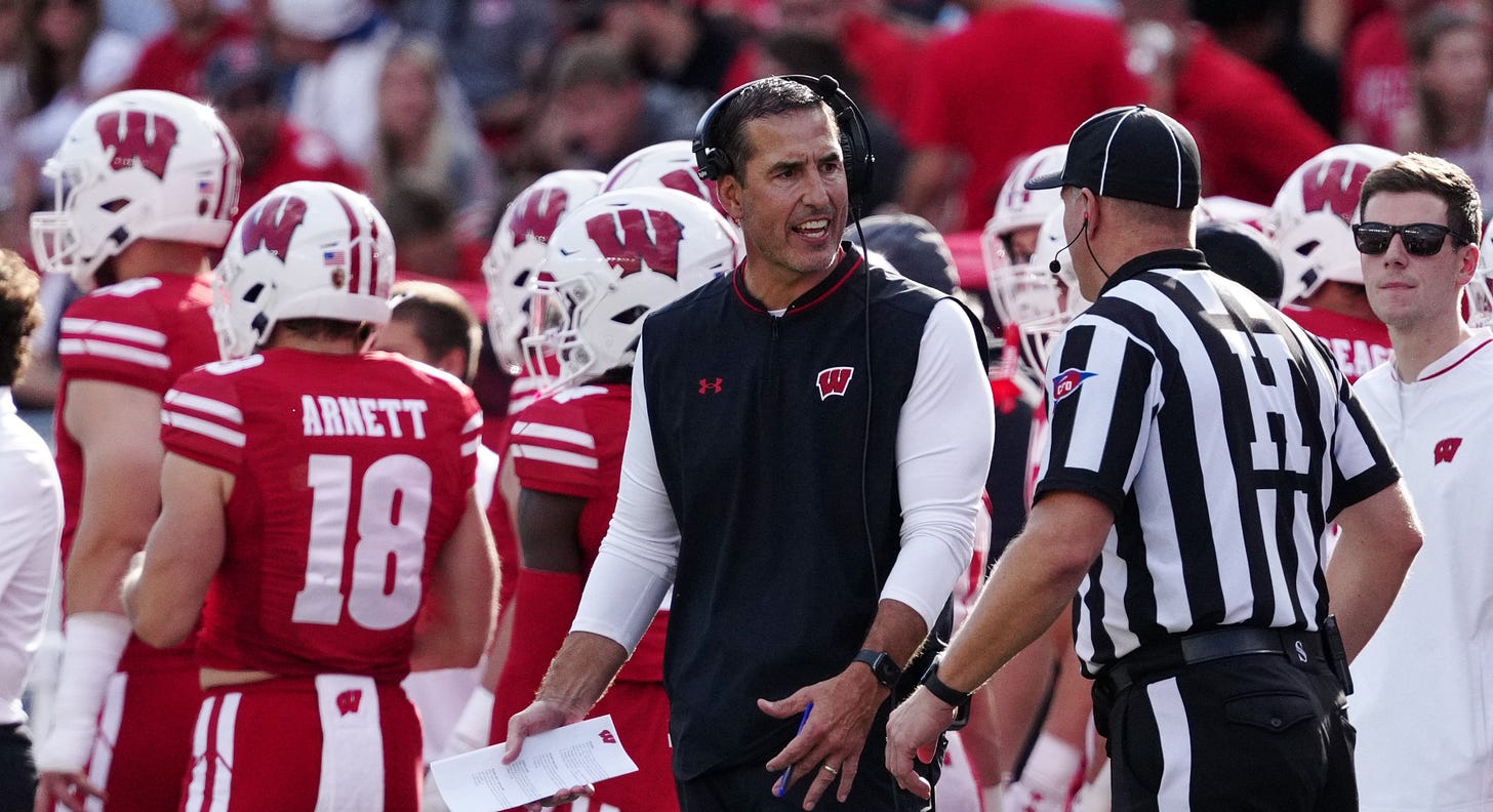 Luke Fickell pleads with an official on the sideline during Wisconsin’s 34–0 loss to Ohio State at Camp Randall Stadium.
