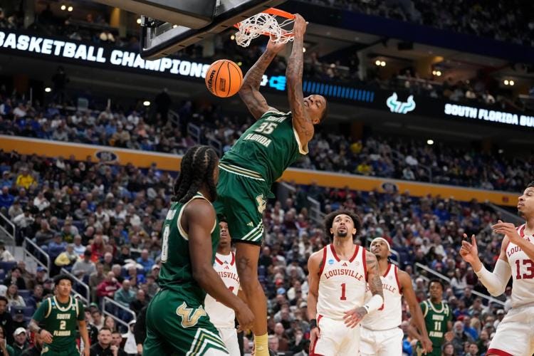 McKneely scores 23 and Louisville beats South Florida 83-79 in 1st ...