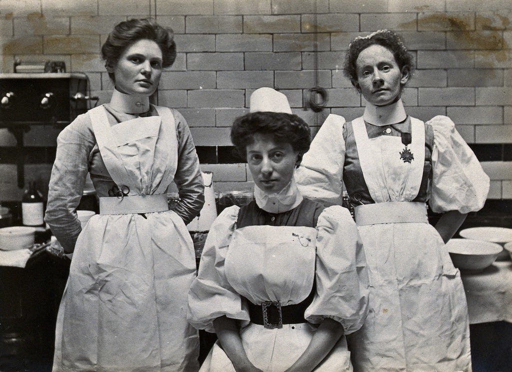 lack-and-white 1904 photograph of theatre staff at Charing Cross Hospital — a visual anchor for actors preparing historical roles by uncovering hidden emotional truths from real people in past eras. lack-and-white 1904 photograph of theatre staff at Charing Cross Hospital — a visual anchor for actors preparing historical roles by uncovering hidden emotional truths from real people in past eras.