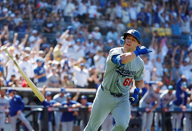 San Diego, CA Dalton Rushing the Los Angeles Dodgers flips his bat after hitting a three-run home run in the seventh inning against the San Diego...
