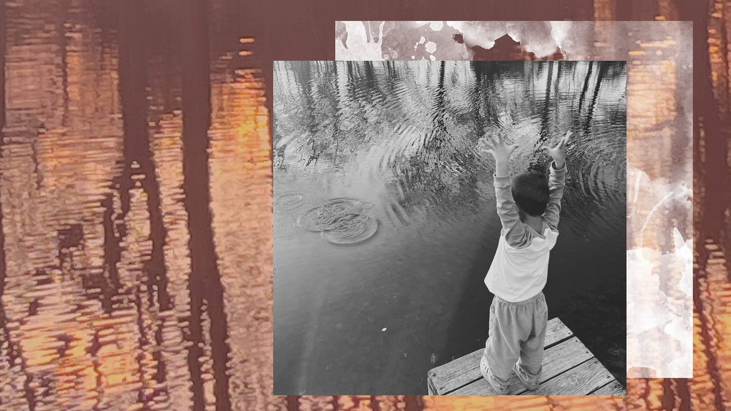 A black and white image of a four year old child raising his hands over his head in front of a pond, where water ripples from the rocks he threw. The image is black and white, layered on top of a splash of a water color frame, behind both images is a pinkish pond with the reflection of bare winter trees and the sky above.