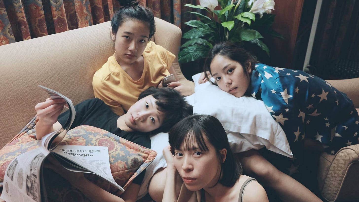 Die Tomorrow | Still features a group of girls huddling on a couch.