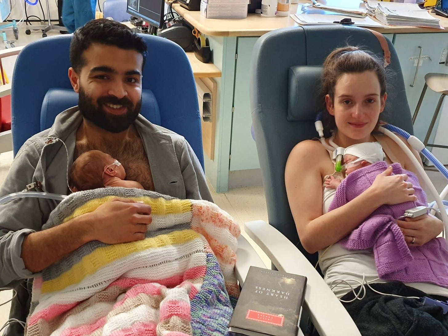 May be an image of baby, smiling and hospital