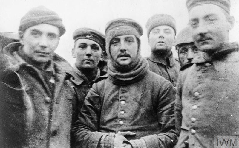 British and German soldiers fraternising at Ploegsteert, Belgium, on Christmas Day 1914, Front of 11th Brigade, 4th Division. British and German soldiers fraternising at Ploegsteert, Belgium, on Christmas Day 1914, Front of 11th Brigade, 4th Division.